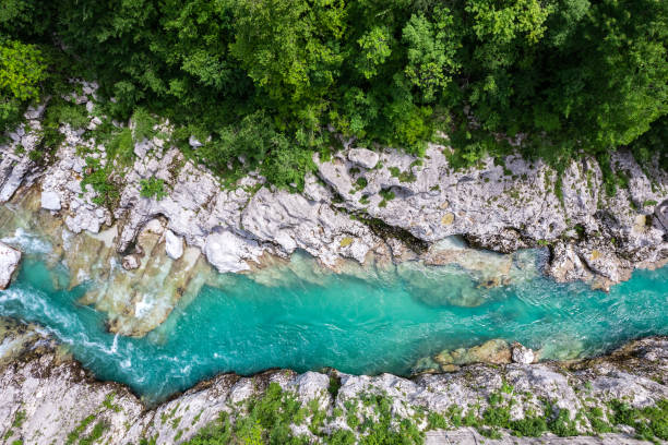 istock Emerald Soca river in Slovenia , aerial drone to down view 1553542779