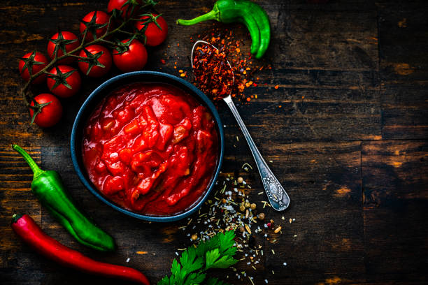 istock Spicy Mexican chili sauce bowl. Copy space 1553543909