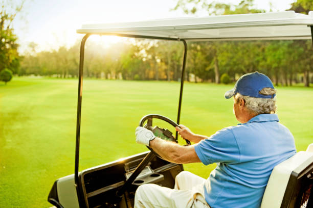 istock Senior man in golf cart 155354434