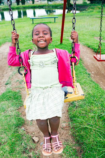 African girl playing on the swings in the park, laughing with joy.
[url=file_closeup.php?id=19220243][img]file_thumbview_approve.php?size=1&id=19220243[/img][/url] [url=file_closeup.php?id=19193966][img]file_thumbview_approve.php?size=1&id=19193966[/img][/url] [url=file_closeup.php?id=19168456][img]file_thumbview_approve.php?size=1&id=19168456[/img][/url]