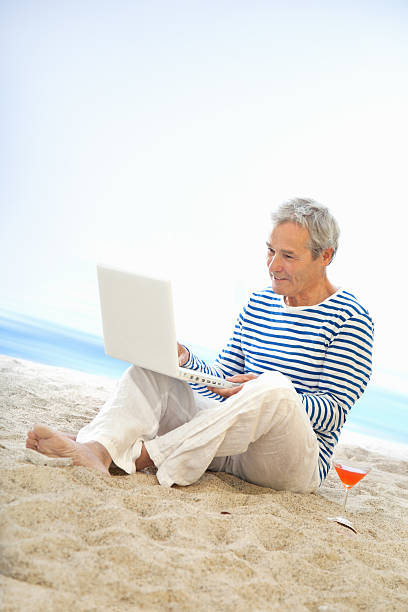 istock Happy Senior Man on the Beach 155354628