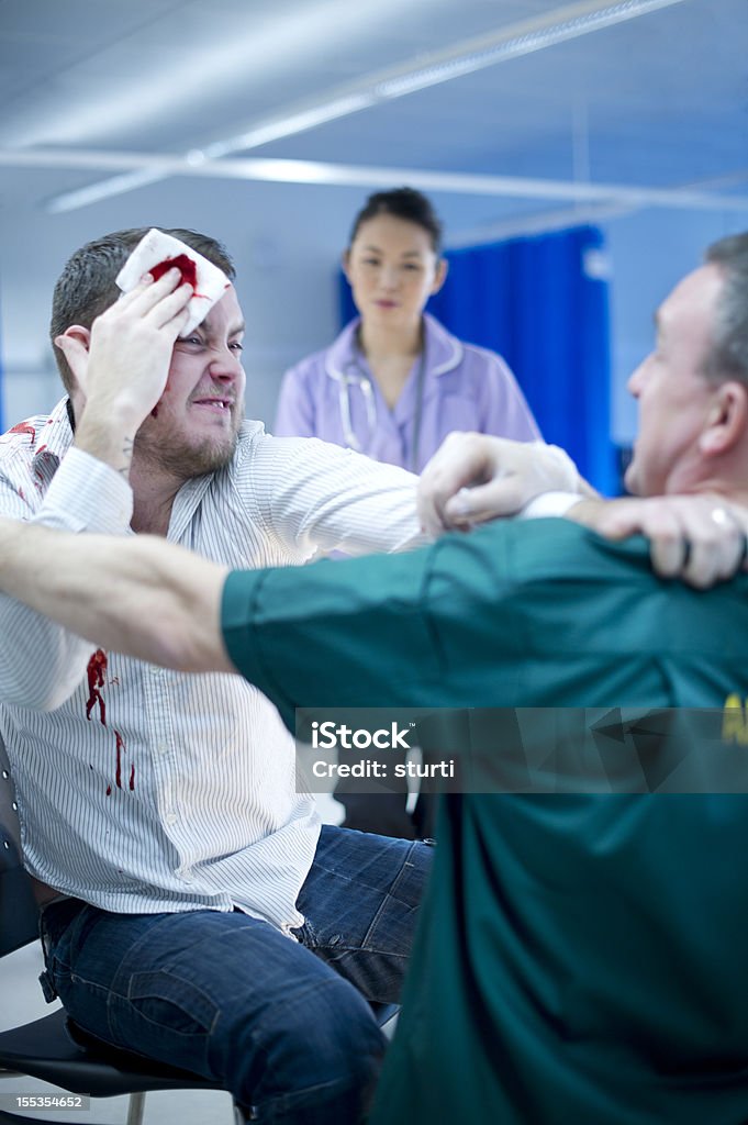 A violência para pessoal hospitalar - Royalty-free Violência Foto de stock