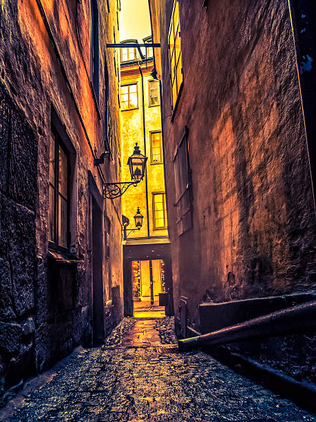 Old alley in Stockholm, Gamla Stan. Grain for the mood.