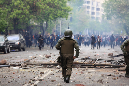 Riot police during a student strike in Santiago, Chile.