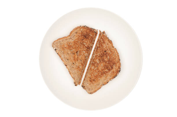 istock diagonal slices toast on white plate 155354852