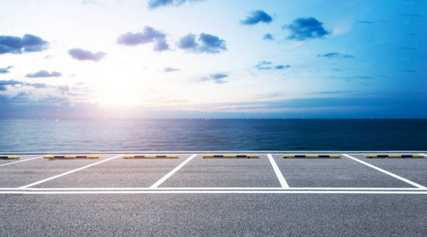 Empty parking lot by the seaside stock photo