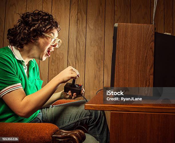 Gamer Nerd Playing Video Games On Tv Stock Photo - Download Image Now - Video Game, Retro Style, Nerd