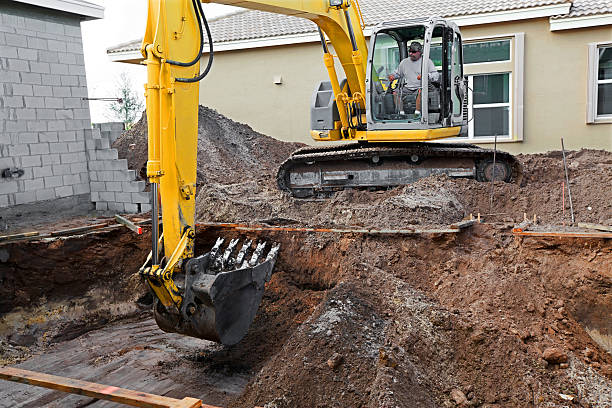 new cement swimming pool construction series Digging a hole for a new swimming pool in my courtyard digging stock pictures, royalty-free photos & images