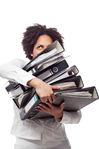 Young business woman carrying archiveshttp://www.vela-photo.com/istock/actors.jpg