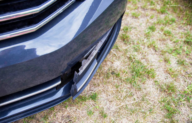 istock Disassembling and removing the fog lamp from a car to replace a burnt out light bulb. Close-up 1553557043