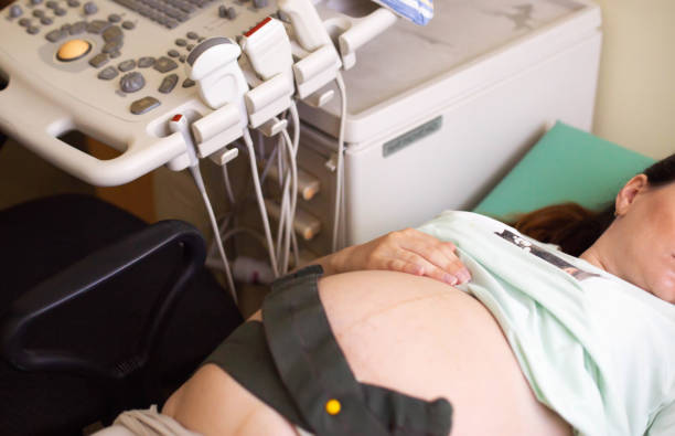 istock Cardiotocography in pregnant women, methodological and functional diagnostics based on the registration of the frequency of fetal cardiovascular diseases and uterine contractility during pregnancy. Fetal heartbeat 1553557557