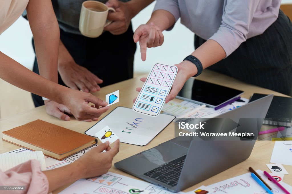 Close Up Of Developer And Ui Designer Brainstorming Interface Wireframe ...