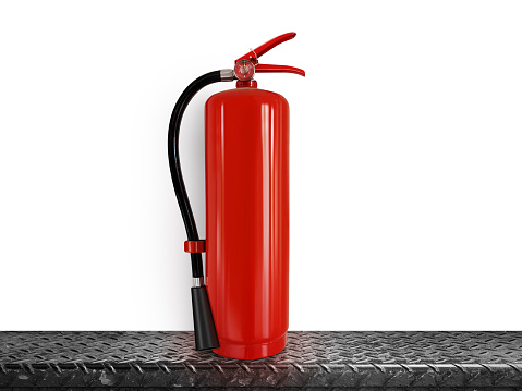 Fire extinguisher on steel background  white back