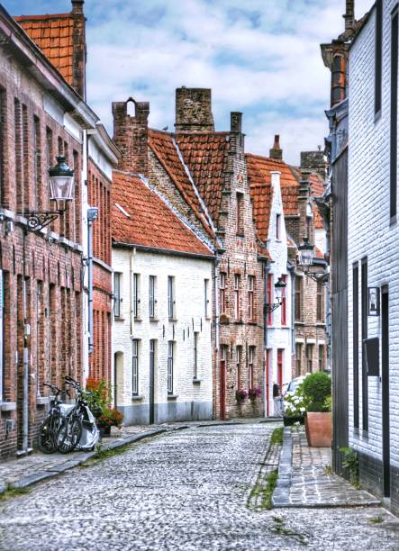 istock Belgium - Brugge Street and Colored Homes 1553568929