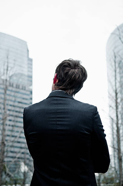 istock Businessman and commercial building 155357167