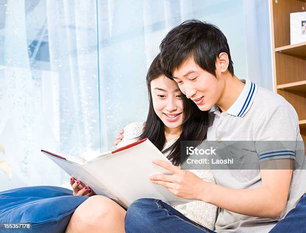 Reading A Book Stock Photo - Download Image Now - 20-24 Years, 20-29 Years, Adult