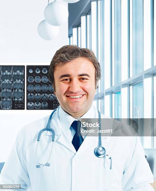 Doctor In The Office Stock Photo - Download Image Now - Adult, Adults Only, Analyzing