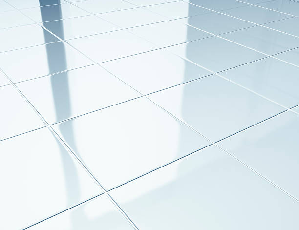 White tiles on a floor in bathroom stock photo