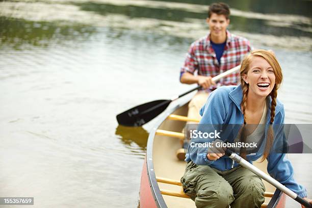 Trying Not To Rock The Boat Stock Photo - Download Image Now - Laughing, Canoe, Women