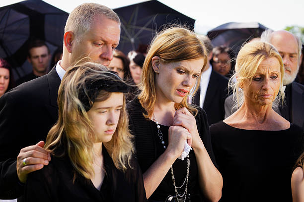 istock Family at a Funeral 155357817