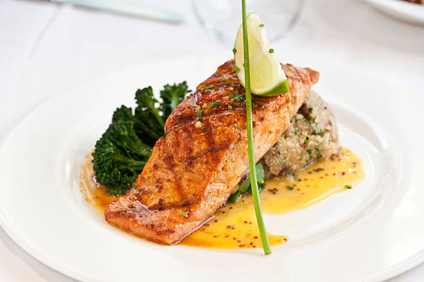 Grilled fillet of Salmon with rice and vegetables