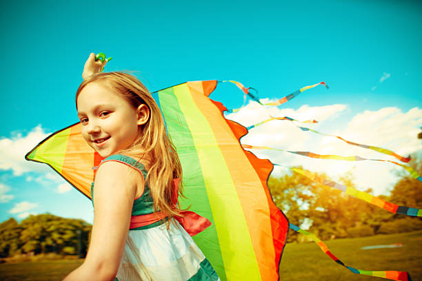 istock Little girl flying a kite 155357959