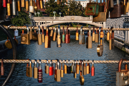 A different angle of Ljubljana's Dragon Bridge, highlighting numerous padlocks left by couples.