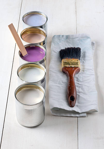 istock cans with pink, purple, white and lavender paint 155358379