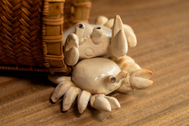 istock Exquisite, handmade, pottery, crab, bamboo weaving, basket 1553585289