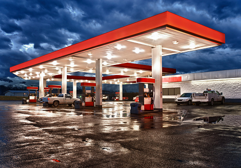 An HDR image of a gasoline station and convenience store after an evening rain.