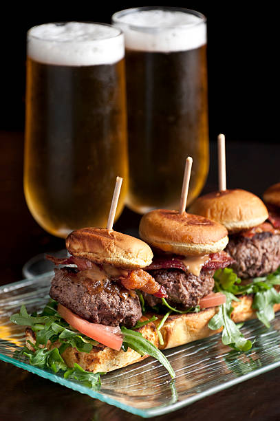 istock Cheese and bacon burger sliders and beer 155358716