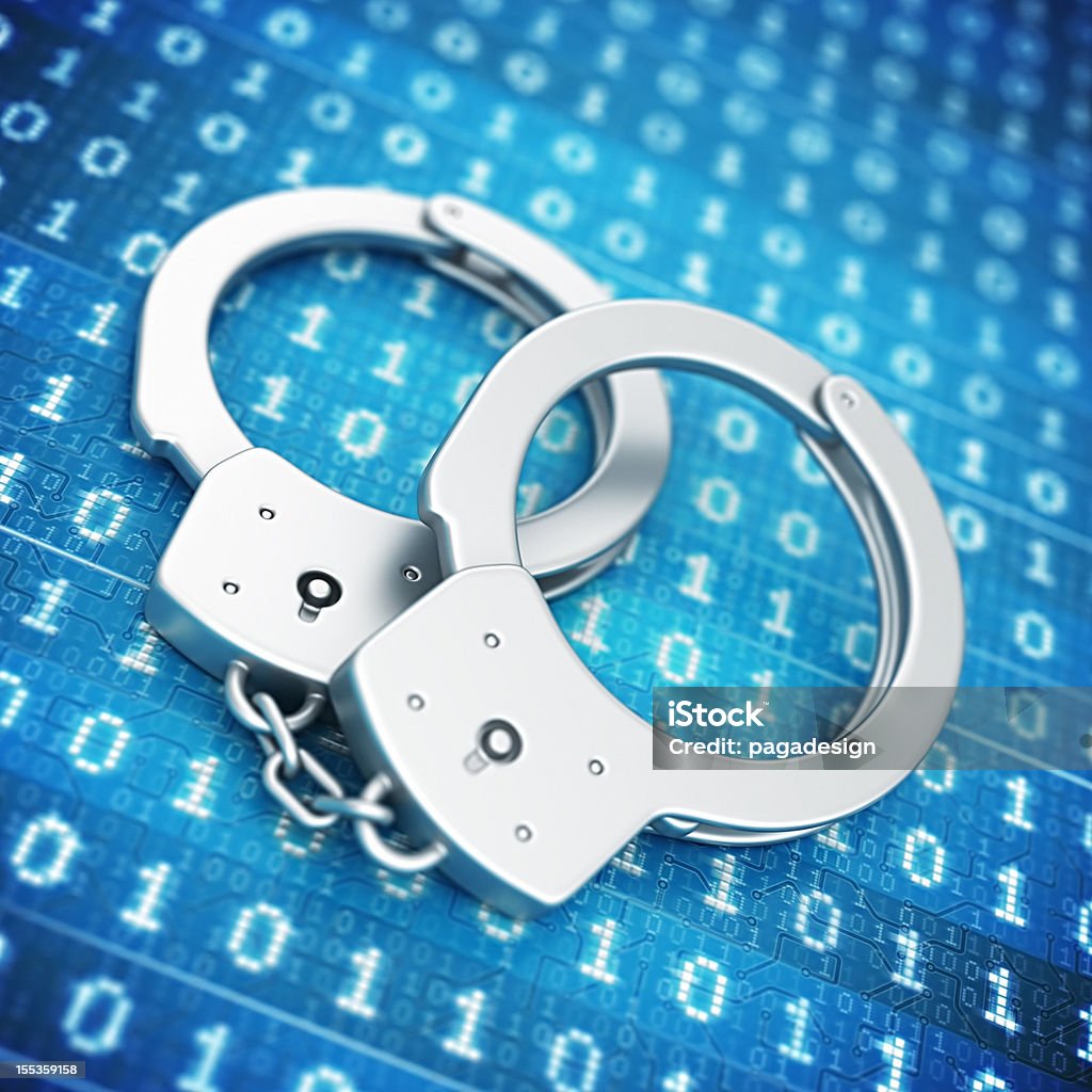 cyber crime siver handcuffs on the cyber background. Handcuffs Stock Photo