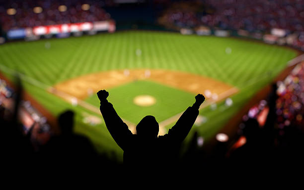 Baseball Excitement Fans excited at a baseball game baseball diamond photos stock pictures, royalty-free photos & images