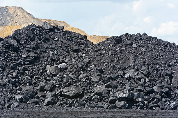 coal heap at loading pad on mine site raw coal heap coal mine stock pictures, royalty-free photos & images