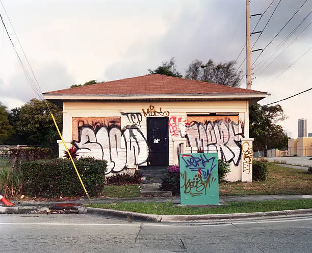 Photo of Abandoned Graffiti Covered Vandalized Miami Home