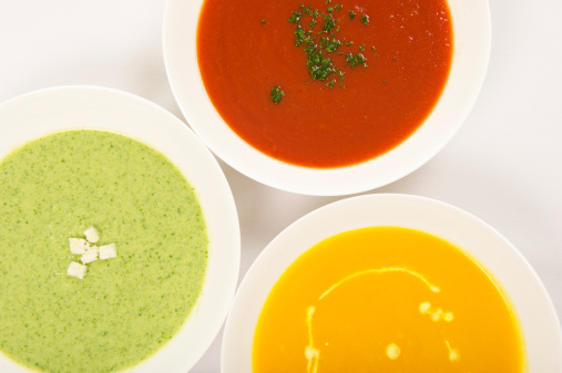 Vibrant multi-colored soups