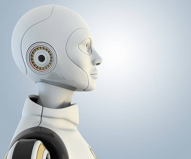 istock White, yellow, and black robotic head and body 155359656