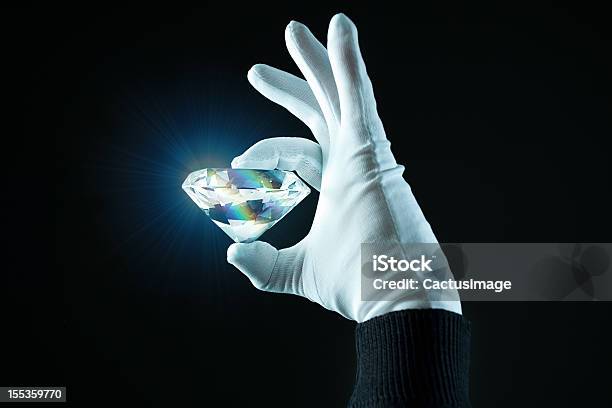 Hand Wit A Diamond Stock Photo - Download Image Now - Diamond - Gemstone, Diamond Shaped, Stealing - Crime