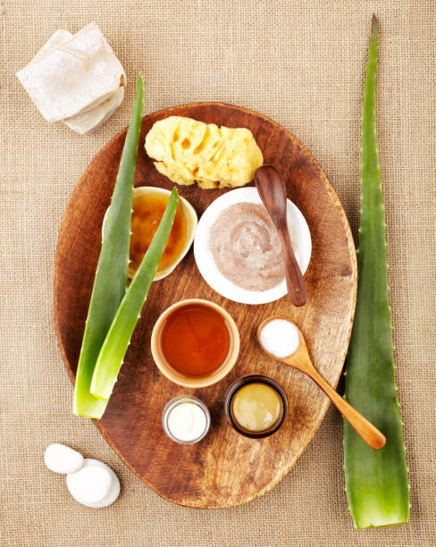 Still life with aloe vera, sugar scrub, honey