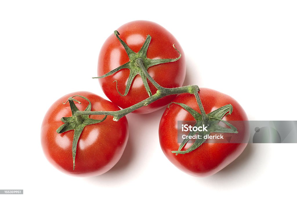 Trois tomates de vigne - Photo de Tomate libre de droits