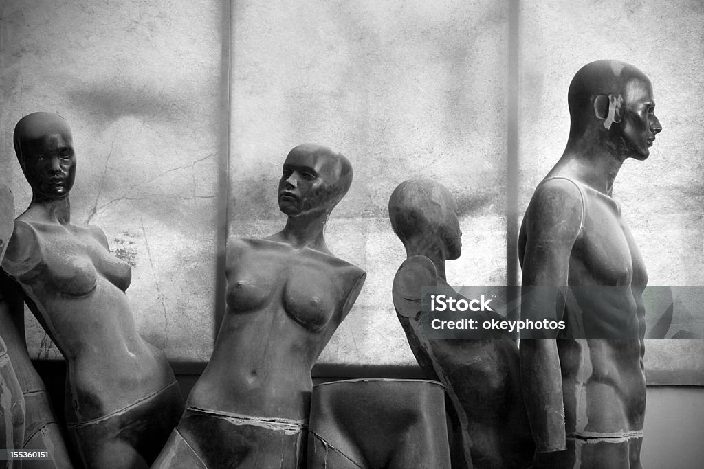 Mannequin series Abandoned mannequins in warehouse  Black And White Stock Photo