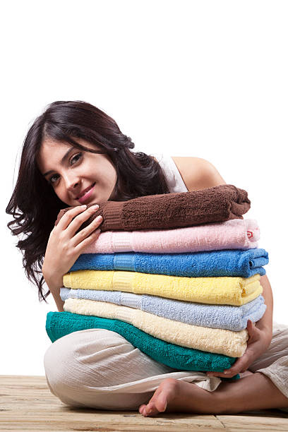 istock Young girl holding towel 155360266