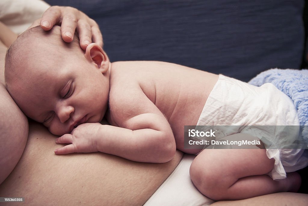 Newborn Baby and Mother Together Young baby (5 weeks old) with mother. Baby - Human Age Stock Photo