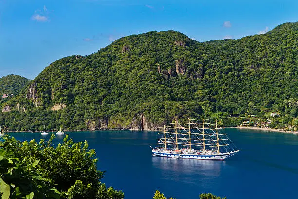 Magnificent sailing ship moored in the Soufrière Bay, on the southwest coast of Saint Lucia. Founded by the French in 1746, Soufrière was the first town of the island.