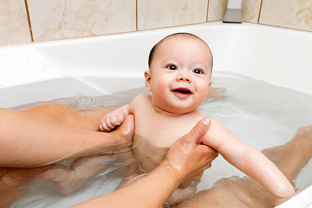 istock Baby in Bathtub 155361820