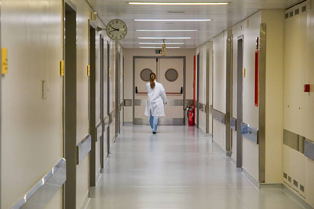 istock Nurse in Hospital Corridor 155362452
