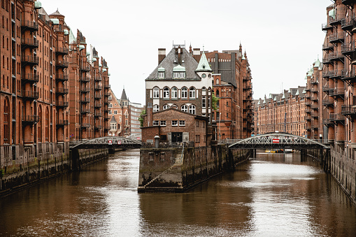 Canal in historic warehouse district Speicherstadt in Hamburg, Germany