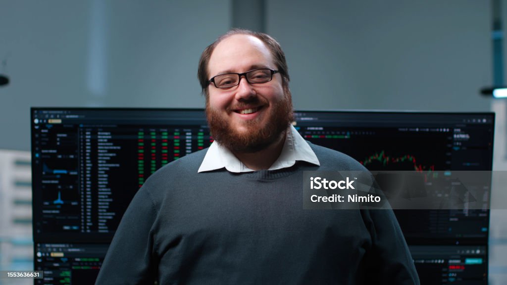 Big Programmer Overweight Itprogrammer Smiling At Camera With Multiple Screens With ...
