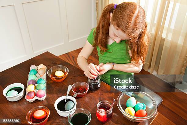 Redhead Little Girl Dyeing Easter Eggs Stock Photo - Download Image Now - 6-7 Years, 8-9 Years, Activity