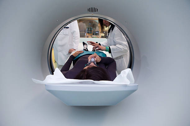 istock Young woman patinet waiting for CAT scan 155368898
